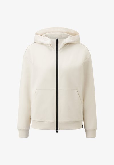 Cremefarbener Hoodie mit durchgehendem Reißverschluss und zwei Vorder-Taschen. Verfügt über eine weiche Textur, einen schwarzen Reißverschluss und eine betonte Kapuze.