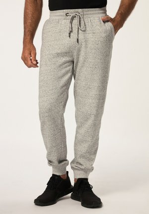 Lichtgrijze joggingbroek van een gestructureerde stof, met een elastische tailleband met trekkoord, zijzakken en geribbelde boorden.