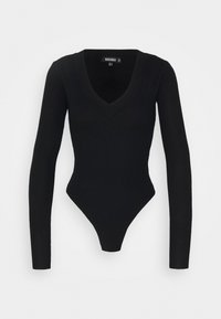 Zwarte lange mouwen bodysuit met een ribbelstructuur, voorzien van een diepe V-hals en een hoge uitsnijding bij het been. Gemaakt van een rekbare stof voor een getailleerde uitstraling.