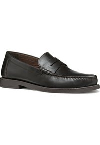 Zwarte leren loafers met een gladde afwerking, gestikte details en een laag hakontwerp. Ronde neus met een decoratieve band.