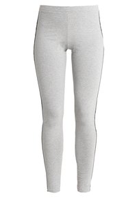 Ljust grå tajta leggings med hög midja och tunna svarta sidosträck som löper längs de yttre sömmarna.