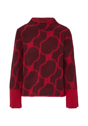 Pull rayé rouge et rouge foncé avec une coupe carrée, un col montant et des manches longues. Fabriqué en un matériau doux et texturé.