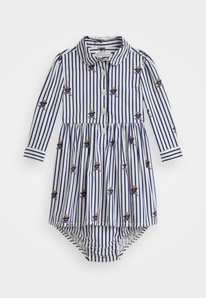 Robe rayée à manches longues, rayures bleues et blanches, patte de boutonnage et imprimé d'ours. Fabriquée en tissu léger avec une jupe évasée.