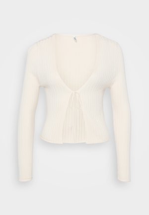 Ribaga koorekardigan, millel on pikad varrukad, V-kujuline kaelus ja eesrihm. Pehme tekstuur täiustab selle kerget disaini.