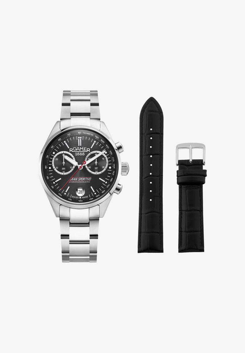 Reloj cronógrafo Roamer 1888 de acero inoxidable con esfera negra, ventana de fecha y correa extra de cuero negro con hebilla.