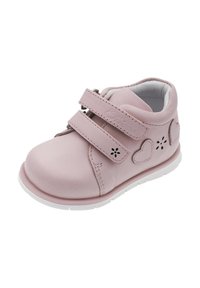 Scarpa in pelle rosa per bambini con doppie cinghie in Velcro, ritagli a forma di cuore e suola in gomma bianca. Design della punta arrotondata. Fodera interna morbida.