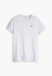 T-shirt blanc uni à manches courtes avec col rond et petit logo rouge Levi's sur le côté gauche de la poitrine.