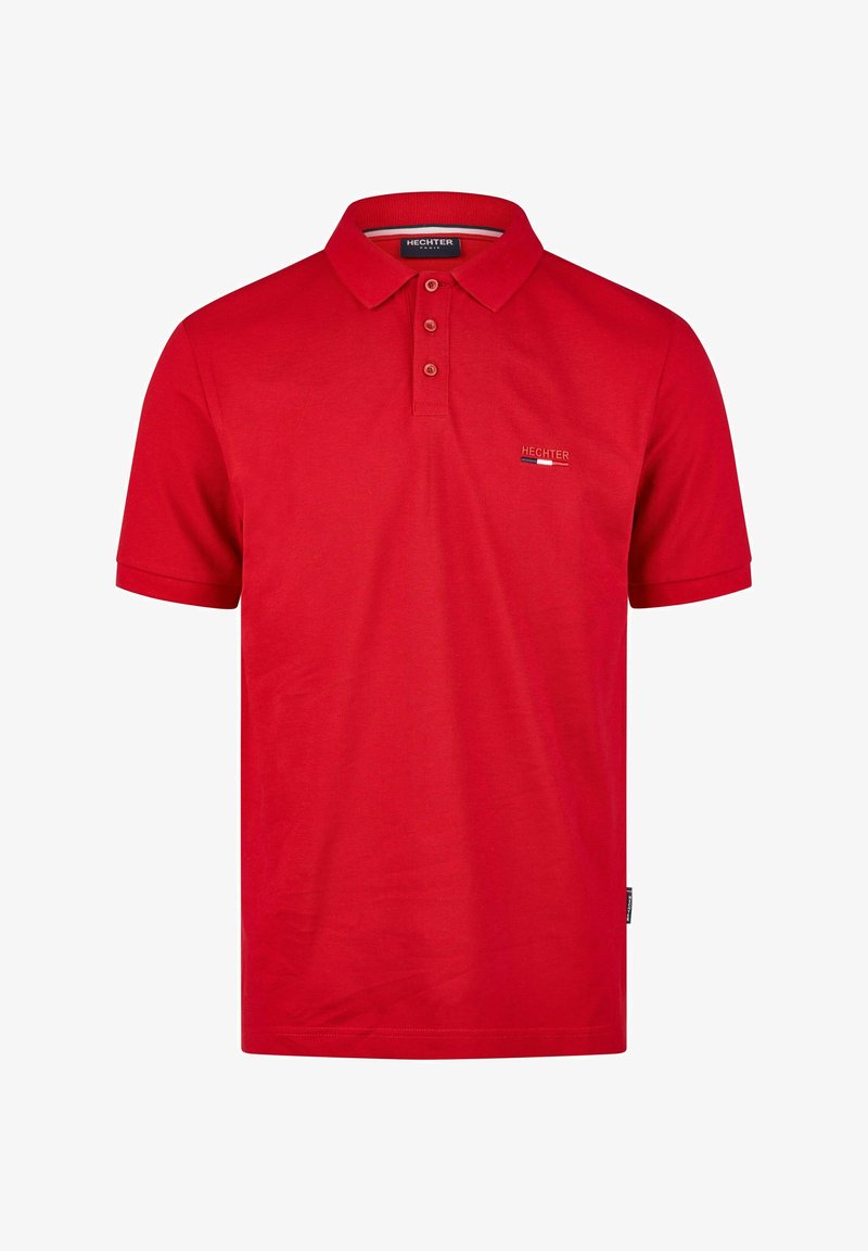 Rotes Polohemd aus Baumwolle, mit Kragen, drei Knöpfen und einem kleinen Logo. Kurzärmlig und mit geradem Schnitt.