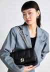 ICON BAG - Cross body bag - black