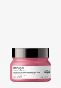 Rosa rund burk med ett svart lock. Etiketten har varumärket "L'Oréal Professionnel" och produktinformation i vit text. Kapacitet är 250 ml.
