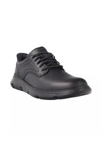 Scarpe in pelle nera con lacci, punta arrotondata, superficie testurizzata e suola imbottita. Presenta piccoli fori di ventilazione sulla parte superiore.