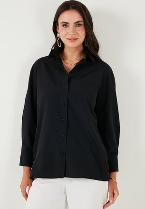 LELA Nööpidega pluus - black