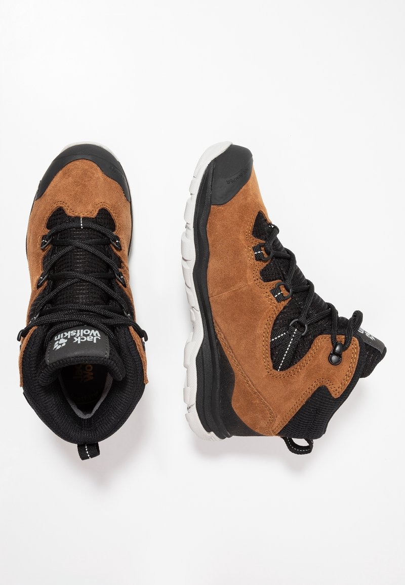 Brown suede hiking boots with black mesh accents, round laces, and gray rubber soles. Includes a loop at the heel for easy wear.