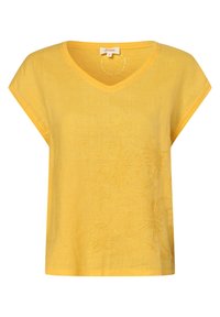 Gul kortærmet bluse i linen med V-udskæring og diskret blomsterbroderi på forsiden til højre.
