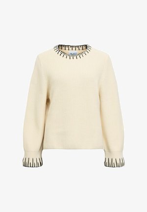 Maglione in maglia color crema con dettagli in punto nero sul collo rotondo e sui polsini, maniche lunghe e tessitura a coste.