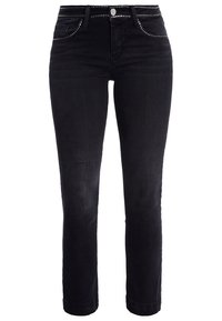 Jeans in denim nero con sottili dettagli in metallo argentato lungo la vita, silhouette aderente e design a gamba dritta. Tessuto di peso medio.
