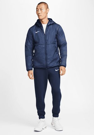 FUSSBALL TEAMSPORT PARK 20 REPEL - Outdoorjas - blau/weiss