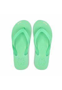 Green flip-flops made of rubber, featuring a textured strap and a flower-like pattern on the sole. The brand name is printed on the strap.