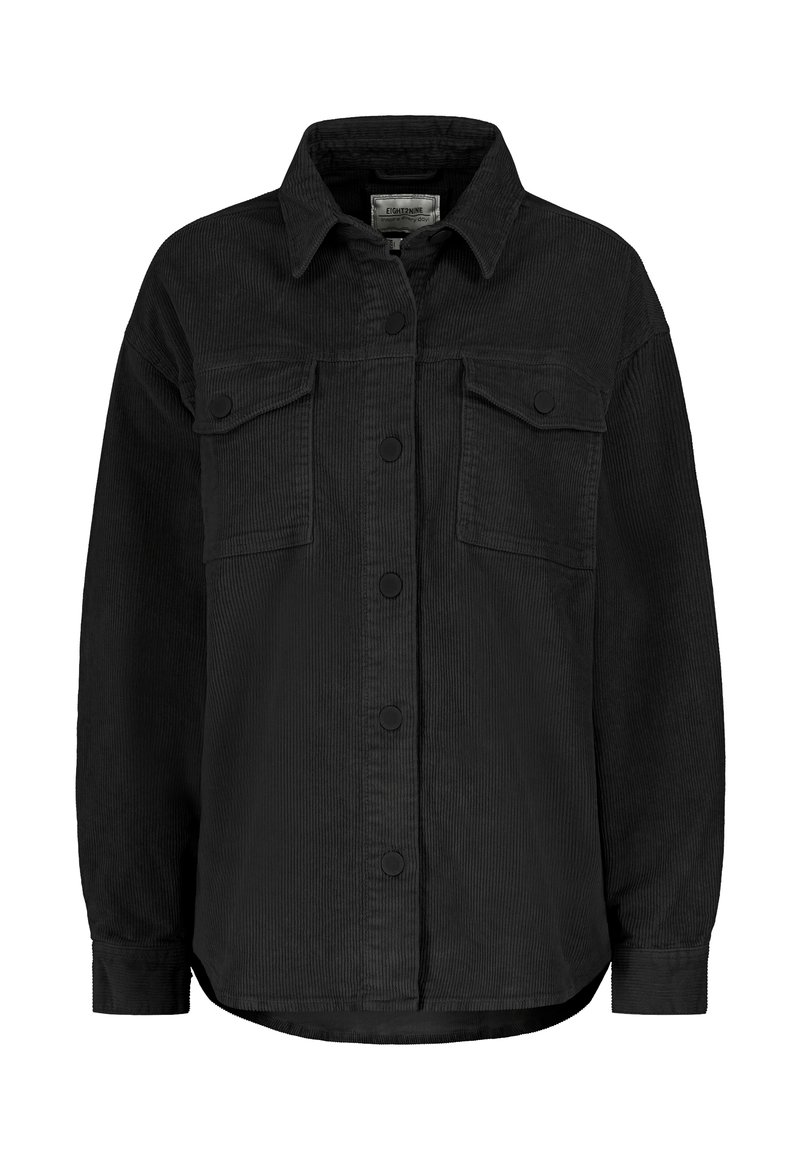 Black corduroy shirt jacket featuring a collared neckline, two front pockets, and button closures. Textured fabric with a relaxed fit.