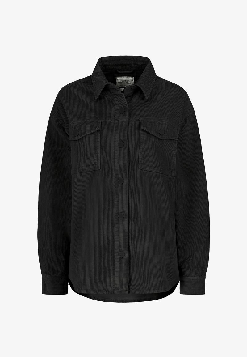 Black corduroy shirt jacket featuring a collared neckline, two front pockets, and button closures. Textured fabric with a relaxed fit.