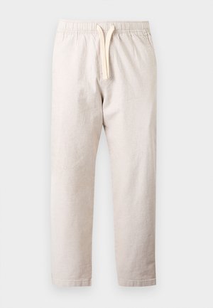Ανοιχτό μπεζ λινό παντελόνι με κορδόνι και ελαστική μέση, με άνετες ίσιες γραμμές, απεικονισμένο σε απλό λευκό φόντο.