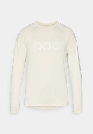 Pitkähihainen, vaalean kermaa oleva paita, jossa on pyöreä pääntie. Edessä on suuri, hillitty valkoinen "POC" -logo. Pehmeä ja kevyt kangas.