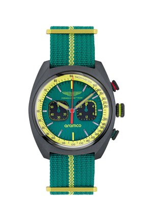 Chonoskopinis laikrodis su žalia audiniu aptrauktą dirželį, kuriame yra geltonos juostos. Juodas korpusas, žalias ciferblatas, geltona tachimetrinė skalė ir du juodi subciferblatai.