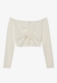 Kappa olkapäiltä crop-top, jossa on ribbidattu vaalean kermafarkkukangas. Etuosassa on kiristettävä yksityiskohta ja pitkät hihat, joissa on aaltoilevat reunat.