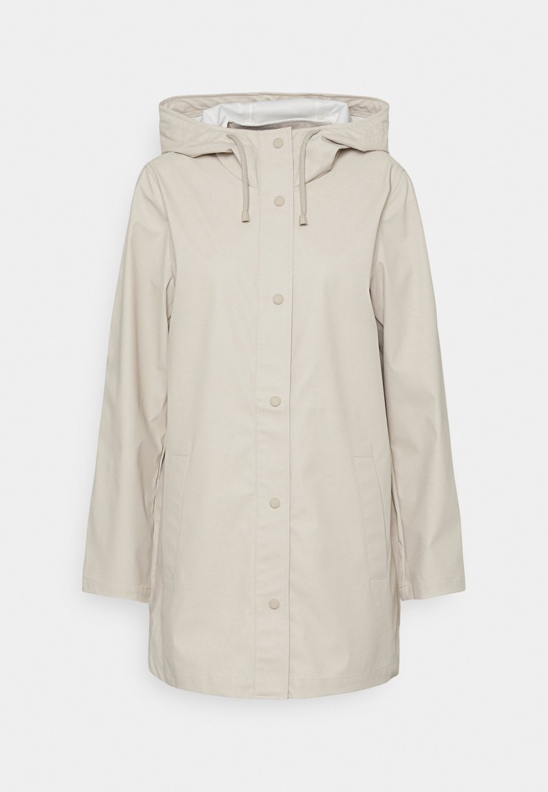 Veste de pluie beige à capuche avec finition mate. Dotée de boutons-pression, de poches latérales et d'un cordon de serrage réglable à la capuche.