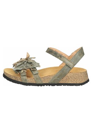 Grønne sandaler med blomsterdekoration, kork midtersål, teksturerede remme og gummiydersål. Har justerbare ankelremme for bedre pasform.