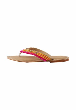 Flat sandal with a beige leather sole, featuring a colorful woven strap in pink and yellow, and decorative metallic accents.