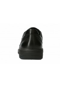 Chaussure en cuir noir avec une finition lisse, forme arrondie et semelle rembourrée. Présente des détails de couture subtils et un design à profil bas.