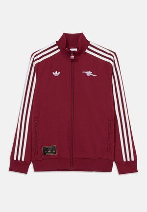 Bordeauxfarbene Zip-Jacke mit hohem Kragen, weißen Drei-Streifen-Akzenten, Adidas-Logo und Arsenal-Wappen. Verfügt über Seitentaschen und gerippte Bündchen.