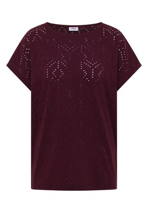 Top de punto de manga corta en color púrpura oscuro con patrón de perforaciones en forma de diamante y escote redondo.