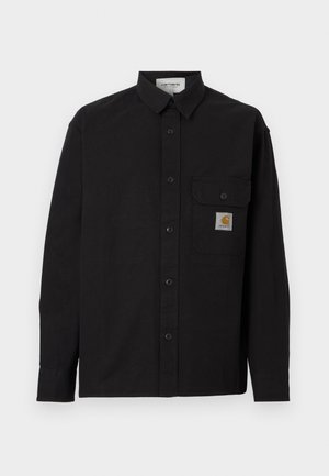 Zwart overhemd met lange mouwen, knoopsluiting, kraag en een borstzakje met één knoop, voorzien van een klein Carhartt-logo.