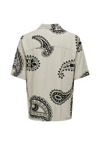 Kurzes Hemd aus leichtem beigem Stoff mit großen schwarzen Paisleymustern und dekorativen Rändern, mit einer lässigen Passform und Kragen.