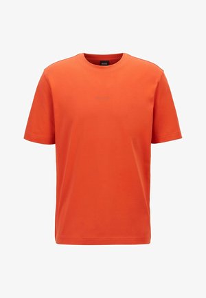 Orange cotton t-shirt with a crew neck and short sleeves. Features a subtle logo in front. Smooth texture and relaxed fit.
