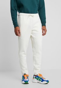 Urban Classics CUT AND SEW PANTS - Tréningruha alsók - sand