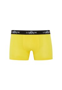 Yellow cotton boxer shorts with a black waistband featuring "LONDON" in white lettering, smooth texture and fitted design.