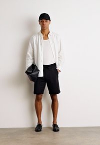 HUGO Pantalon de survêtement - black