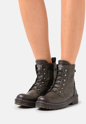 Bottines à plateau - oliv