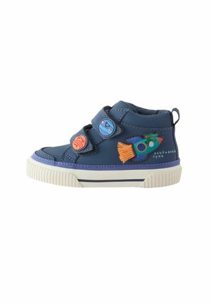 Navy blue children's sneaker with two Velcro straps featuring planet designs and a rocket patch with orange flame on the side.