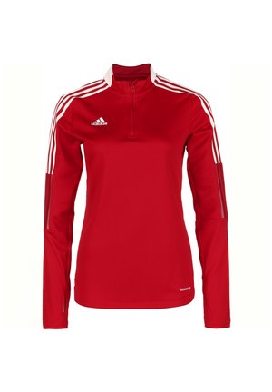 Rode sporttop met lange mouwen en een kwart rits, witte accenten en drie witte strepen op elke schouder. Gemaakt van lichtgewicht, ademend materiaal.
