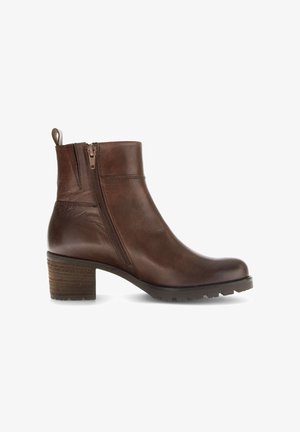 Brown leather ankle boot with a rounded toe, side zipper, textured block heel, and subtle stitching details, featuring a pull tab at the back.