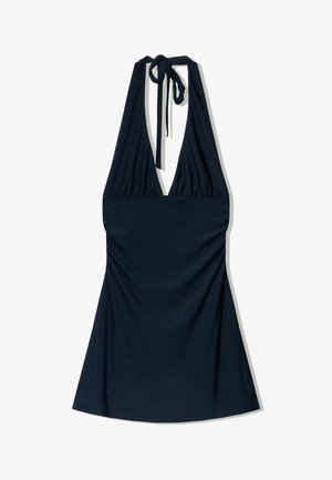 Navy halter dress made of soft fabric, featuring a deep V-neck, gathered waist, and a flowing silhouette with a tie at the back.