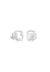 Orecchini in argento a forma di orso, con un design a contorno. Finitura liscia e lucida con chiusura a clip e uno stile minimalista.