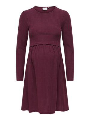 Long-sleeve, ribbed knit maternity dress in deep burgundy with empire waist and round neckline.