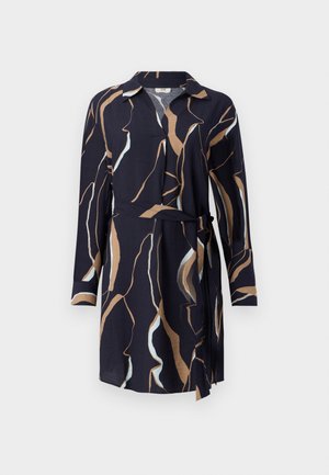 Long-sleeve navy wrap dress with abstract beige and light blue wavy patterns and a fabric belt tied at the waist.