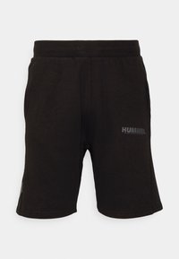 Pantalones cortos deportivos negros con cinturilla elástica, bolsillos laterales y un pequeño logo reflectante de "HUMMEL" en la parte delantera de la pierna derecha.