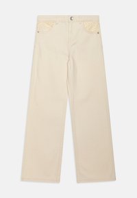 Beige vide bukser laget av denim, med teksturerte lommer med blomstermønster og en frontknapplukking med sølvfarget hardware.